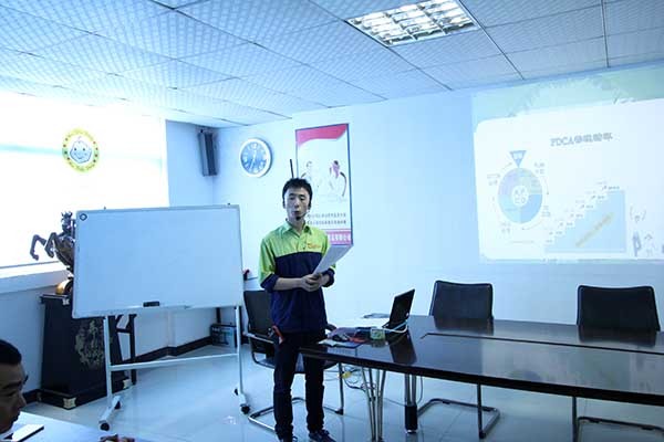 酷豆丁对全体员工进行质品培训